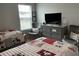 Comfortable bedroom featuring two twin beds with Disney-themed bedding, a dresser and two armchairs at 413 Cedarview Rd, Summerville, SC 29486