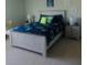 A bedroom with a full-size bed, white wood frame and blue bedding at 413 Cedarview Rd, Summerville, SC 29486