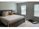 This bedroom offers natural light and a cozy atmosphere with soft, neutral tones at 413 Cedarview Rd, Summerville, SC 29486
