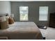 This bedroom features ample natural light with soft, neutral colors and a relaxing atmosphere at 413 Cedarview Rd, Summerville, SC 29486