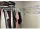 This closet offers ample storage space with hanging clothes and shelving at 413 Cedarview Rd, Summerville, SC 29486