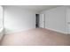 Bright bedroom with neutral carpet, light gray walls, and a closet at 436 Cedarview Rd, Summerville, SC 29486