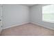 A spare bedroom with neutral carpet and white walls at 436 Cedarview Rd, Summerville, SC 29486