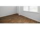 Entryway with beautiful wood-look floors, a bright window, and a white paneled door at 436 Cedarview Rd, Summerville, SC 29486