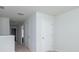 A hallway with white walls and multiple doors at 436 Cedarview Rd, Summerville, SC 29486