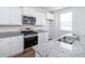 Beautiful kitchen featuring granite counters, stainless appliances, an island, and white cabinetry at 436 Cedarview Rd, Summerville, SC 29486