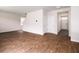 An open-concept living room showcases hardwood floors, neutral paint, and a modern design at 436 Cedarview Rd, Summerville, SC 29486