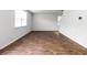 Bright living room features hardwood floors, many windows, and plenty of natural light at 436 Cedarview Rd, Summerville, SC 29486