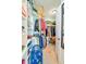 Walk-in closet with shelving, hanging racks and plenty of storage space at 4846 Causey Pond Rd, Awendaw, SC 29429