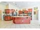 Spacious kitchen with a large center island, stainless steel appliances, and ample cabinet space at 4846 Causey Pond Rd, Awendaw, SC 29429