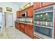 Kitchen featuring stainless steel appliances and wood cabinets at 4846 Causey Pond Rd, Awendaw, SC 29429