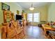 Bright living room featuring hardwood floors and lots of natural light at 4846 Causey Pond Rd, Awendaw, SC 29429