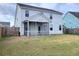 Two-story home with a screened porch and backyard at 609 Sienna Way, Summerville, SC 29486