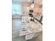 Kitchen boasts stylish island with granite countertops and modern fixtures at 609 Sienna Way, Summerville, SC 29486