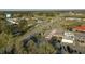 Aerial view of intersection and businesses, showcasing gas stations and commercial areas in the vicinity of the property at 6156 Badham Dr, Reevesville, SC 29471