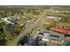 Aerial view of commercial property with gas station, restaurants, and retail in a high-traffic area at 6156 Badham Dr, Reevesville, SC 29471