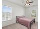 Neutral bedroom with carpeting, and natural light from two windows at 686 Redbud Ln, Summerville, SC 29486