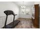 Spacious dining room with chandelier lighting, wainscoting, and wood floors providing an elegant space at 686 Redbud Ln, Summerville, SC 29486