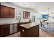 Well-designed kitchen with an island, stainless steel appliances, granite counters, and hardwood flooring at 686 Redbud Ln, Summerville, SC 29486
