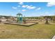 Community playground featuring modern equipment and a safe, enclosed area for children to enjoy outdoor activities at 686 Redbud Ln, Summerville, SC 29486