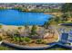 Scenic view of a pond surrounded by lush greenery and landscaped grounds, offering a serene and tranquil environment at 686 Redbud Ln, Summerville, SC 29486