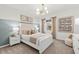 Serene bedroom featuring soft pastel accents, elegant lighting, and comfortable furnishings at 739 Meadowbrook Ln, Summerville, SC 29486