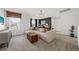 Bright loft-style living room with a stylish sectional, study space, and large window at 739 Meadowbrook Ln, Summerville, SC 29486