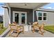 Cozy outdoor patio with modern seating, perfect for relaxing and enjoying the outdoors at 739 Meadowbrook Ln, Summerville, SC 29486
