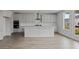 Modern kitchen with white cabinets, a center island, and stainless steel appliances at 752 Maynard Ln, Summerville, SC 29486