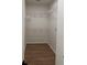 Spacious walk-in closet with wood floor, and wire shelving for organized storage at 752 Maynard Ln, Summerville, SC 29486