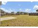 Expansive backyard with concrete patio, surrounded by lush greenery, providing an ideal space for outdoor gatherings at 85 Arrowwood Way, Summerville, SC 29485