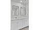 Modern bathroom with double sinks and white shaker cabinets at 85 Arrowwood Way, Summerville, SC 29485