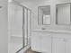 Bathroom featuring a glass-door shower and white shaker cabinets at 85 Arrowwood Way, Summerville, SC 29485