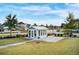 Community area with blue building and well-maintained landscaping at 85 Arrowwood Way, Summerville, SC 29485