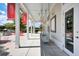 Relaxing community porch with porch swings and bright red seating areas at 85 Arrowwood Way, Summerville, SC 29485