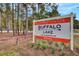 Summers Corner at Buffalo Lake community sign surrounded by lush greenery at 85 Arrowwood Way, Summerville, SC 29485