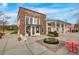 Exterior of the Corner House Cafe and community building with outdoor seating and water feature at 85 Arrowwood Way, Summerville, SC 29485