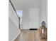 Bright foyer with hardwood floors, staircase, and a charming decorative table at 85 Arrowwood Way, Summerville, SC 29485