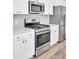 Close-up of a modern kitchen with stainless steel appliances and ample counter space at 85 Arrowwood Way, Summerville, SC 29485