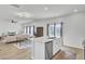 Bright, open-concept kitchen with an island that overlooks the living area at 85 Arrowwood Way, Summerville, SC 29485
