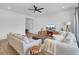 Inviting living room with hardwood floors, neutral decor, and a ceiling fan at 85 Arrowwood Way, Summerville, SC 29485