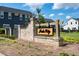 Community entrance sign on a brick base with professional landscaping at 85 Arrowwood Way, Summerville, SC 29485