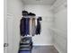 Walk-in closet with shelving for clothes and additional storage for luggage at 85 Arrowwood Way, Summerville, SC 29485