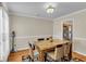 Inviting dining room featuring a large marble-top table and a view into the kitchen at 9360 S Moreto Cir, Summerville, SC 29485