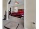 Spacious carpeted main bedroom featuring a trey ceiling, fan, walk-in closet, and neutral decor at 9360 S Moreto Cir, Summerville, SC 29485