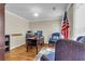 Home office featuring a wooden desk, comfortable seating, and ample natural light at 9360 S Moreto Cir, Summerville, SC 29485