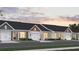 Charming single-Gathering homes feature attached garages, welcoming front porches, and well-manicured landscaping at 945 Dusk Dr, Summerville, SC 29486