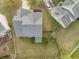 Aerial view of home showcasing roof, landscaping, and fenced backyard at 9684 Pebble Creek Blvd, Summerville, SC 29485