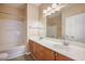 Bathroom features double sink vanity, and a shower-tub combo with modern fixtures at 9684 Pebble Creek Blvd, Summerville, SC 29485