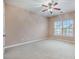 Bright bedroom with large windows for natural light, carpeted floors, and a ceiling fan at 9684 Pebble Creek Blvd, Summerville, SC 29485